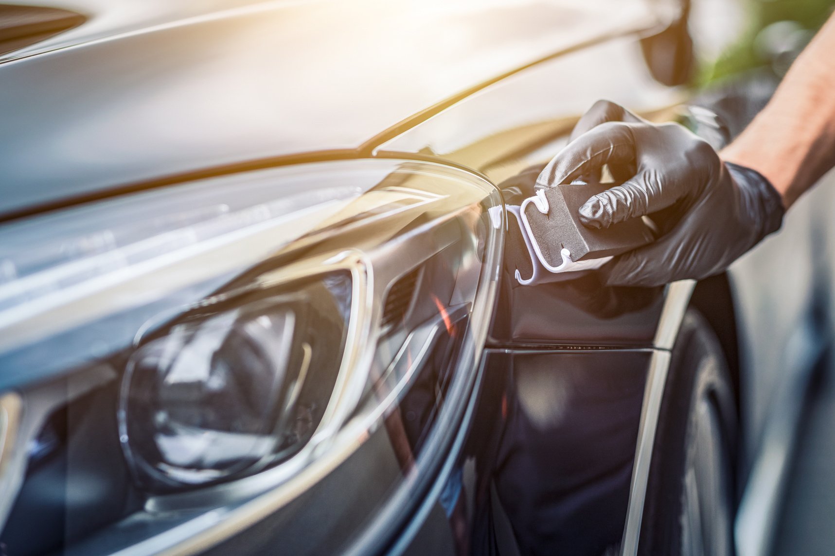 Person Polishing a Car